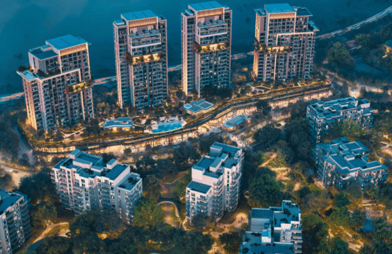 modern residential complex with multiple high-rise buildings, green spaces, and a pool