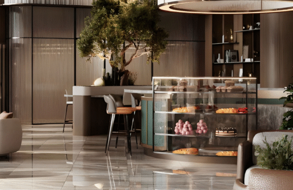 Elegant café interior with dessert display and bar stools