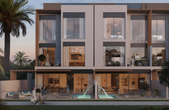 Evening view of townhouse with pool at Terra Golf Collection Phase 2