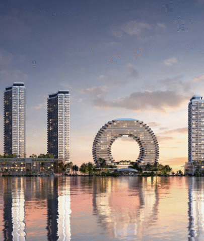 The skyline view of Sobha AquaCrest towers by Sobha Realty reflected in the water, showing the entire waterfront development.