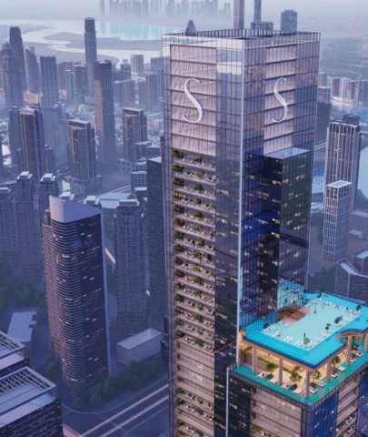 The main Sobha SkyParks skyscraper and the surrounding dense urban cityscape, viewed from above.