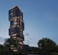 Modern high-rise building with a unique, stacked design and illuminated windows at dusk, surrounded by trees and greenery .