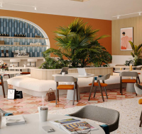 Open-plan living room with floor-to-ceiling windows