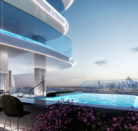 Infinity pool with city skyline view at dusk.