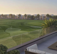 Panoramic view of the championship golf course in Jumeirah Golf Estates surrounded by villas.