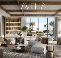 Spacious contemporary living area with soft-toned seating, indoor-outdoor connection, and family-friendly ambiance.