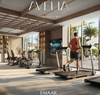 Modern indoor gym with treadmills, strength equipment, large windows, and natural outdoor views .