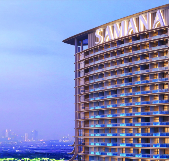Spacious living area with high ceilings and natural light