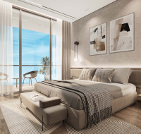 Master bedroom with island and sea views