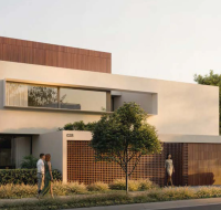 The contemporary facade of a home in the Grand Polo Club & Resort community, featuring elegant landscaping.