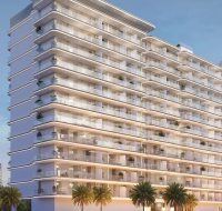 Modern mid-rise residential tower with curved balconies and palm-lined entrance in Dubailand, Dubai