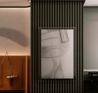 Modern bedroom with an orange upholstered headboard and a dedicated workspace with a marble desk.