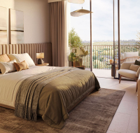 Luxurious open-plan living and dining area at Distrikt, featuring modern furniture, high ceilings, and large windows