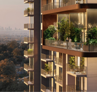 Exterior view of a contemporary building featuring balconies with outdoor lounge areas and integrated greenery