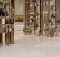 living room with modern sofa, marble coffee table, and abstract art.