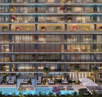 Curved building design featuring landscaped surroundings and elevated views