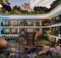 Rooftop deck with lounge seating, telescope, and fire pit overlooking treelined streets