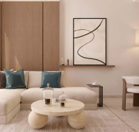 Apartment interior showcasing an open-plan living and dining area with contemporary furniture and artwork