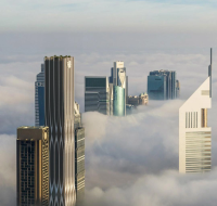 AHS Luxury Office Tower exterior showcasing a modern glass facade along Sheikh Zayed Road.