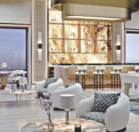 A high-end entertainment lounge featuring a sophisticated bar area, elegant seating, a pool table, and city views.