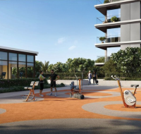 Outdoor gym with fitness equipment and people exercising