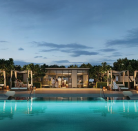 Evening view of the luxurious poolside lounge at Montiva by VIDA with cabanas and ambient lighting
