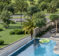 Outdoor swimming pool with loungers, gym equipment, and green landscape.