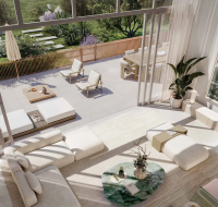 Modern living room with floor-to-ceiling windows opening to a spacious outdoor terrace featuring lounge chairs, dining area, and garden view.