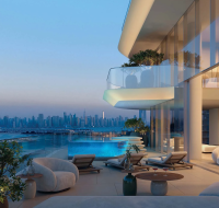 Terrace with private pool and city skyline views at sunset