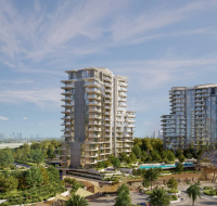 Ellington Properties' residential tower featuring curved balconies, overlooking a landscaped pool area and a city skyline.