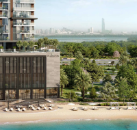 An elegant duplex living space inside Riverton House, featuring a double-height ceiling and contemporary, mindful design.