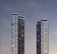 The elegant facade of Sobha AquaCrest residential towers, mimicking the flow of light and waves.