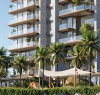 A modern residential building exterior with glass balconies, palm trees, and a shaded outdoor children's play area.