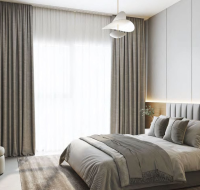 Stylish bedroom design featuring minimalist furniture, wall art, and floor-to-ceiling curtains.