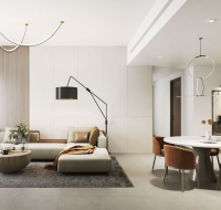 Elegant living and dining area with modern furniture, neutral tones, and stylish lighting fixtures.