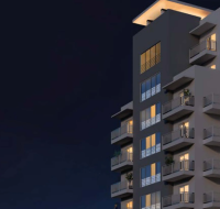 Evening view of South Garden Tower 3 by WASL with illuminated balconies and modern architectural design.