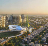 view of modern villas, tall buildings, and a tower that looks like the Eiffel Tower